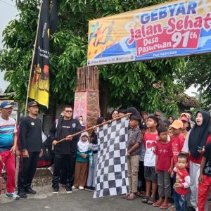 Ali Wardana DPRD Lamsel Hadiri dan Undi Hadiah Utama Satu Unit Sepeda Motor di Gebyar Jalan Sehat HUT Desa Pasuruan ke-91