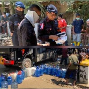 Polri Salurkan Air Bersih dan Bagikan Masker Untuk Warga Terdampak Banjir di Nagan Raya Aceh